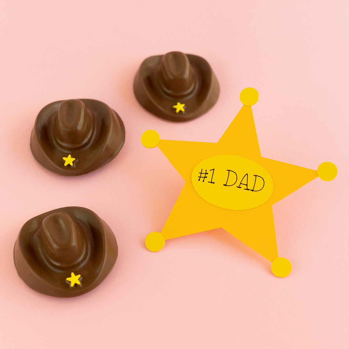 Cowboy chocolates with Father's Day badge.